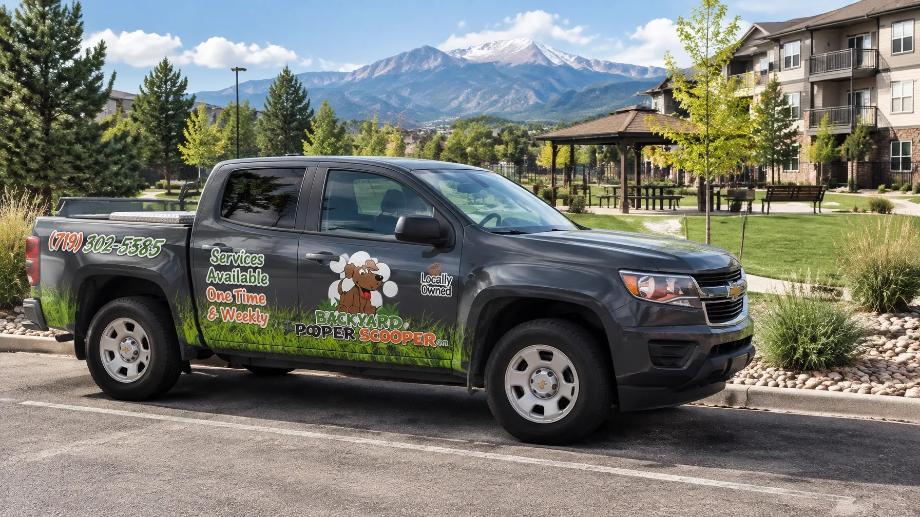 Backyard Pooper Scooper darker fleet truck parked outside a shared community property in Colorado Springs