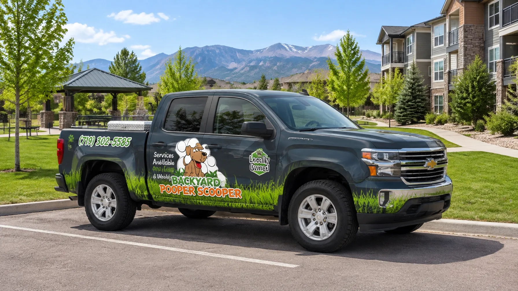 Backyard Pooper Scooper different real fleet truck beside a clean shared outdoor community space in Colorado Springs