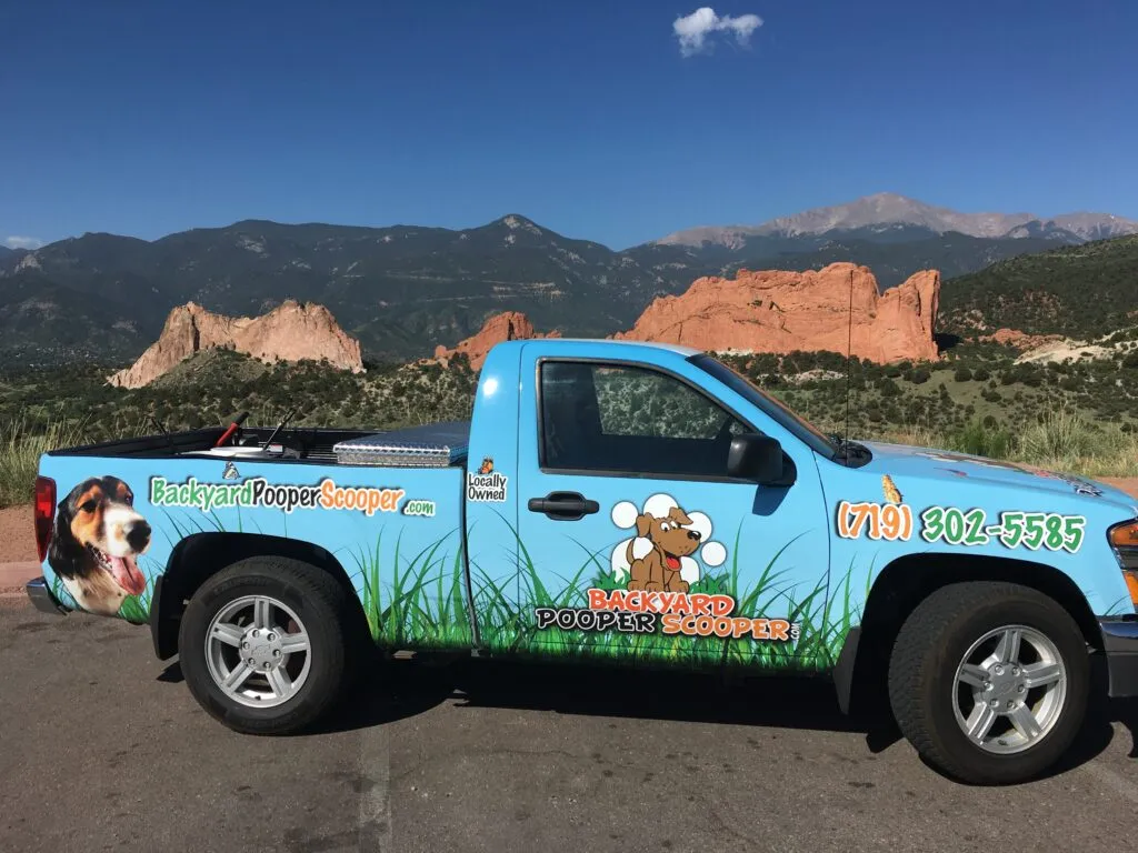 Backyard Pooper Scooper service truck with Garden of the Gods in the background